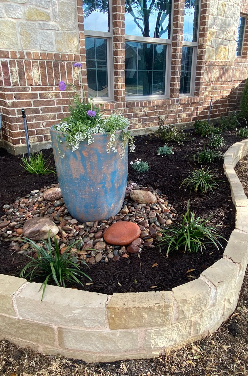 Flower Pot In Flower Bed